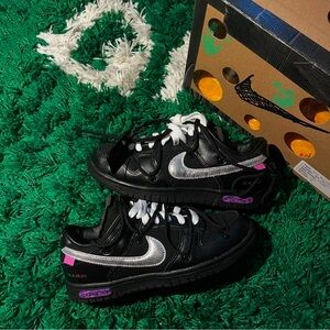 Nike Black Sneakers with Silver and Pink Accents